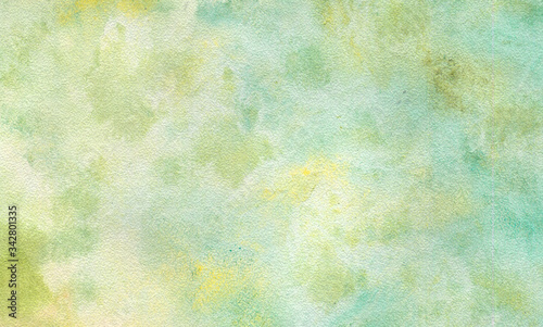 Abstract light color watercolor background. Hand drawn green  yellow gradient painting