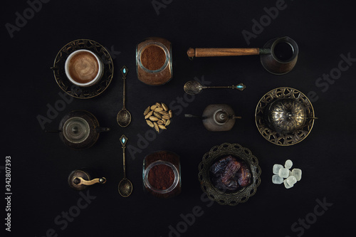 Detail of a coffee drink oriental style. Coffee table concept background photography inspired by turkish and arabic coffee drinking tradition.