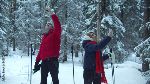 Tourists lost in the forest and catch a connection on the phone