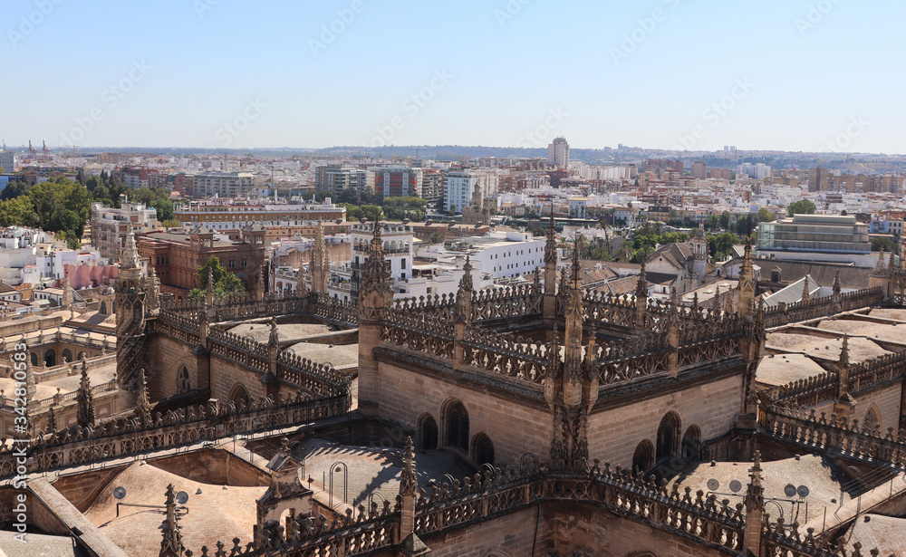 A wonderful aerial view across the roof, domes and spires of the Seville Cathedral. Andalusia, Spain.