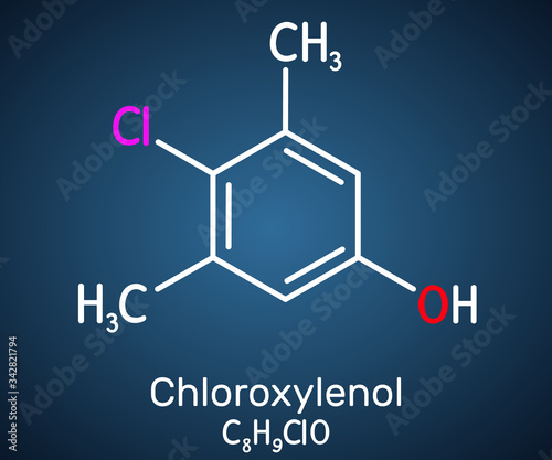 Chloroxylenol, C8H9ClO PCMX molecule. It is an antiseptic and disinfectant for skin disinfection and surgical instruments. Structural chemical formula on the dark blue background