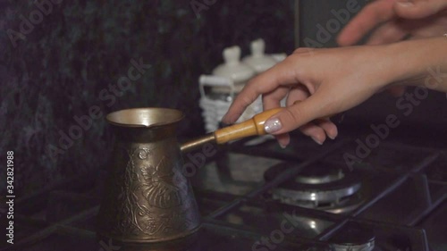 girl brews morning coffee for her boyfriend in Turk photo