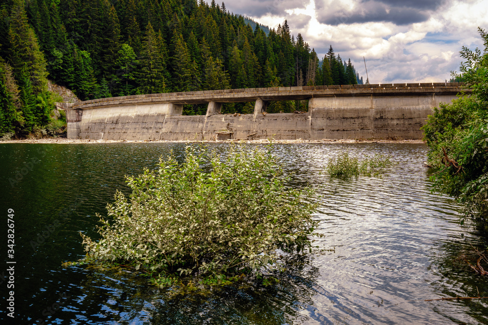 Fototapeta premium Dam lake in the mountains