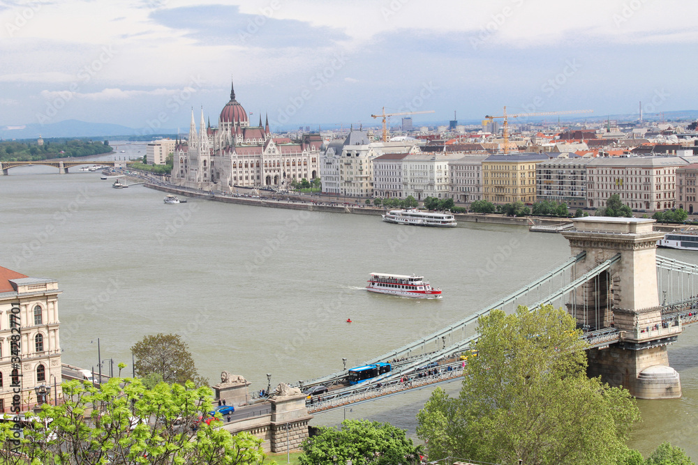Panoramic view of the parliament, city and river in the spring day. Budapest. Hungary.
