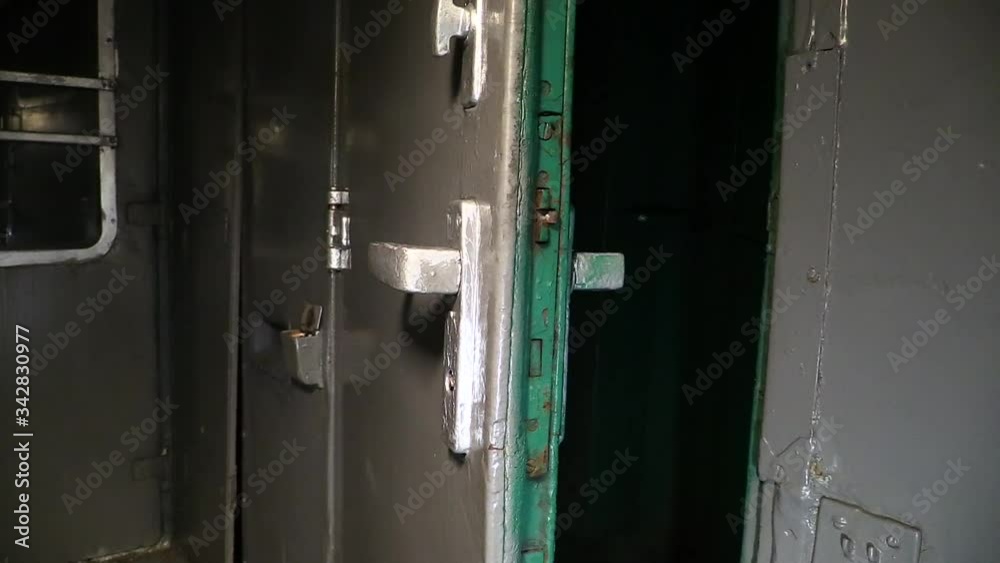 The door of the vestibule in the train sways when moving The door of the vestibule in the train sways when moving