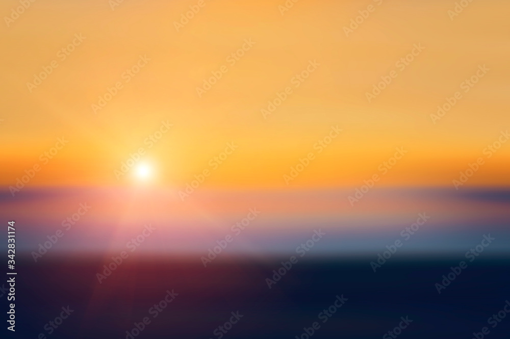Beautiful view of the evening sunset. Blurred natural background.