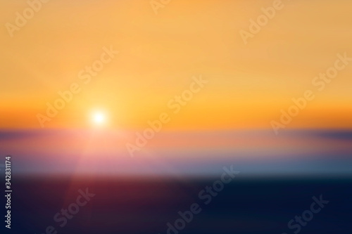 Beautiful view of the evening sunset. Blurred natural background.