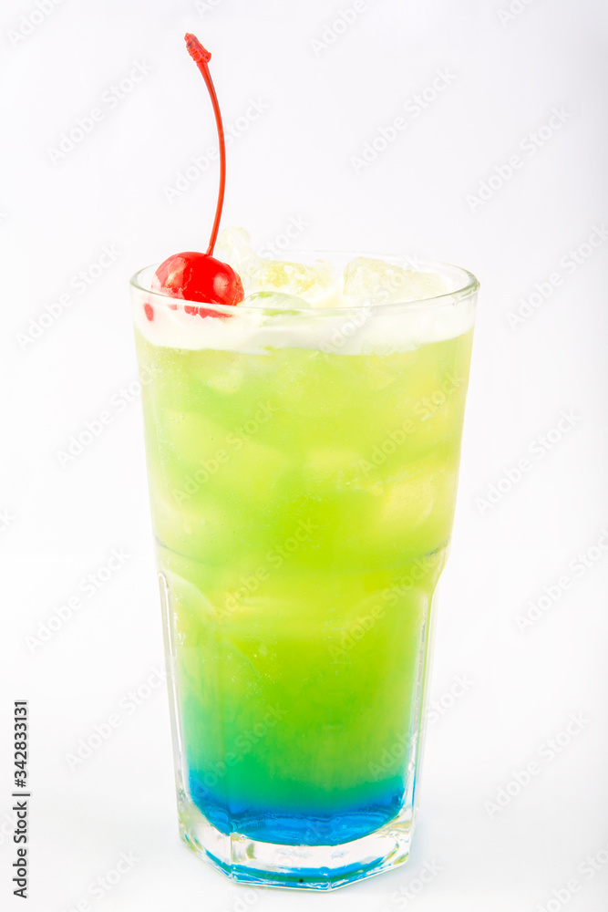 green with a blue bottom drink in a tall glass green with a blue bottom drink in a tall glass