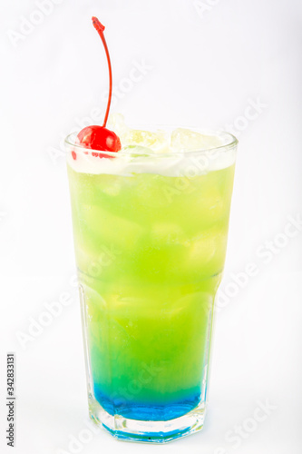 green with a blue bottom drink in a tall glass