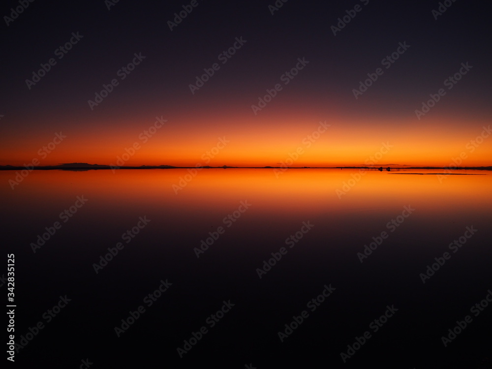 Sunrise on the world's largest salt flat, Uyuni Salt Flat, Salar de Uyuni, Bolivia. Copy space for text