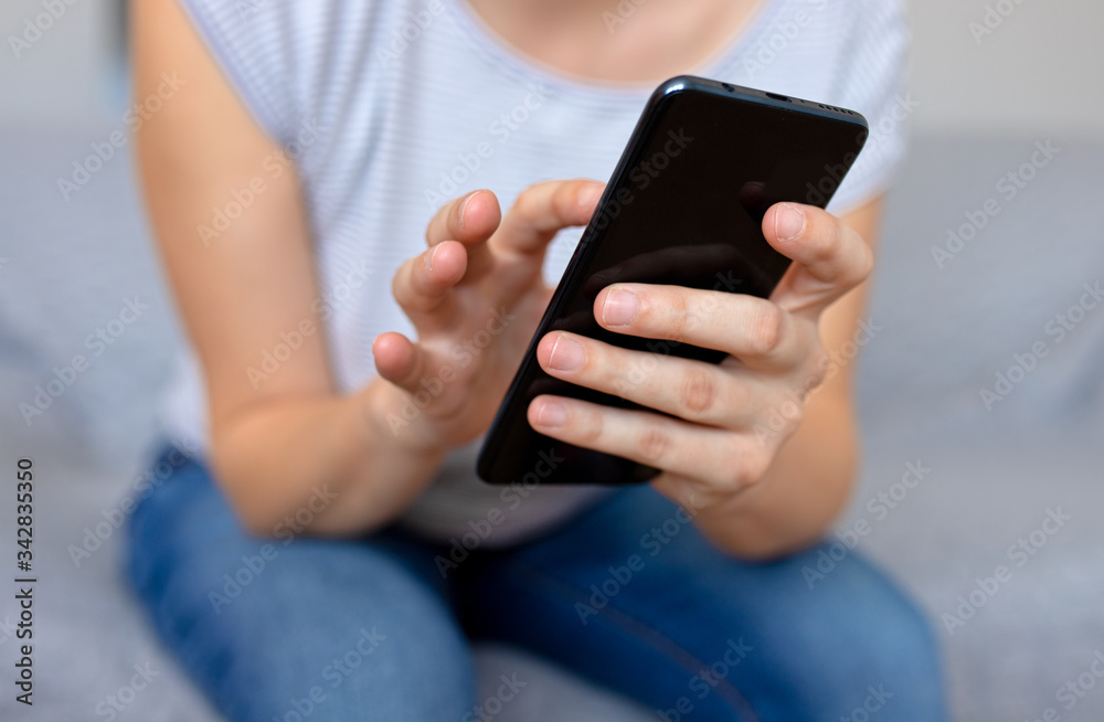 Smiling young woman with mobile. Surfing the internet concept,social media. Young woman using her smart phone. Smart phone with social media icons