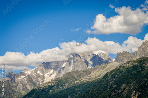 French Alps mountains in a cloudy summer day  seen from Les Houches near Chamonix  Haute Savoy  France.