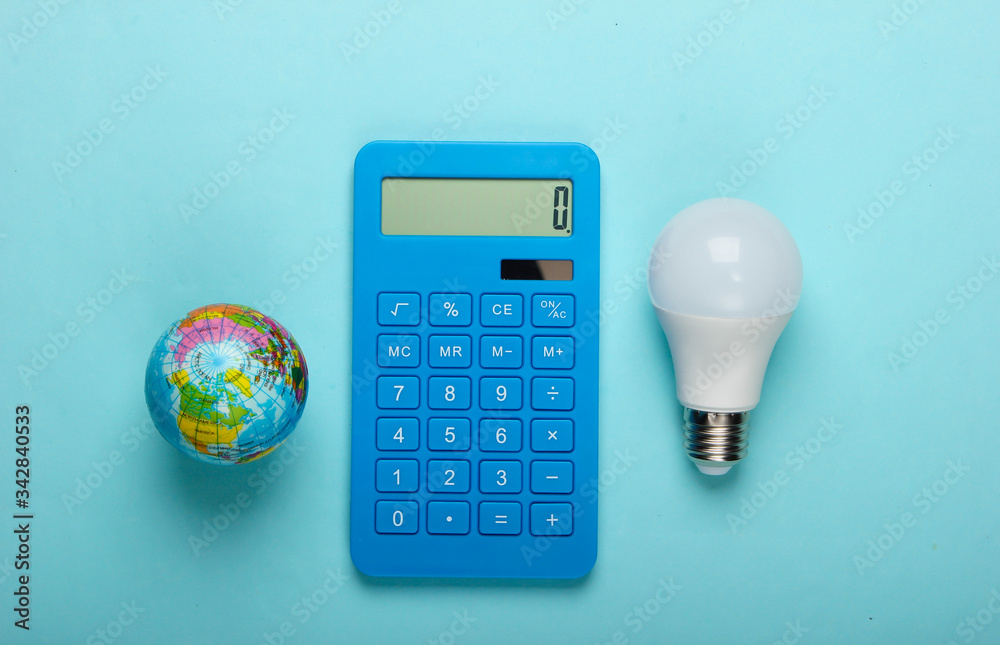 Energy saving. Calculator with led light bulb and globe on blue pastel  background. Save planet. Eco concept. Top view Stock Photo | Adobe Stock