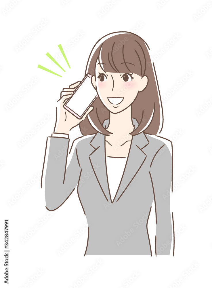 笑顔でスマホで通話する女性 笑顔でスマホで通話する女性