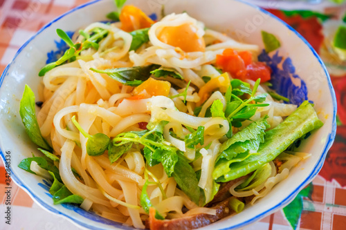 Vietnamese noodle Mi Quang at Tra Que vegetable village  Hoi An old town  Vietnam