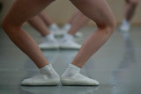 Beautiful legs in plie at ballet dancers