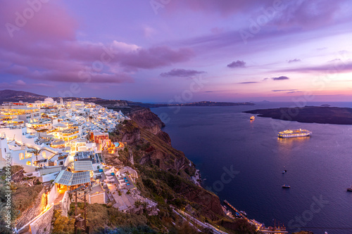 Traveling concept background. Artistic style, amazing sunset, Santorini island, Greece. Summer sunset landscape, vacation and travel holiday in famous destination. Exotic background