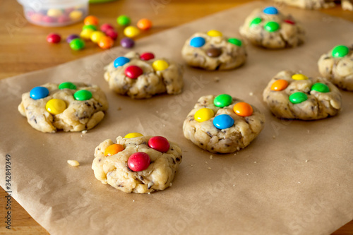 Cooking together at home. Stay and safe. Isolation. Make homemade cookies with colored pills