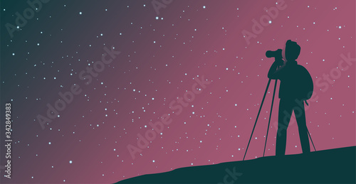 A man tourist photographs the starry sky. Silhouette on a night background. Vector illustration.