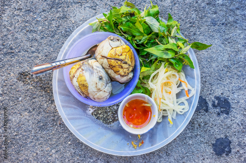 Balut (boiled developing duck embryo) in Hoi An, Vietnam. This is a special cuisine in Asia countries. photo