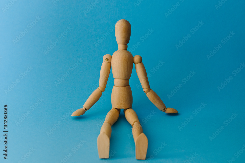 Wooden mannequin with empty miniature shopping cart running for sales on red background. Mockup for shopping, sales, black friday, copy space, side view. Wooden mannequin with empty miniature shopping cart running for sales on red background. Mockup for shopping, sales, black friday, copy space, side view.