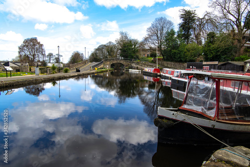 A view looking east along the Union Canal at the Canal Basin at Linlithgow, West Lothian, Scotland.  The basin is maintained by the Linlithgow Union Canal Society. photo
