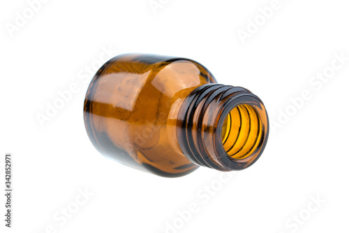 small glass bottle on a white background isolated