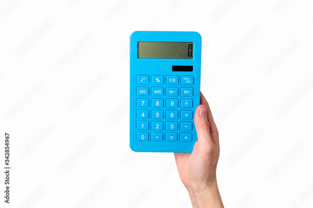 Hand holds blue calculator Isolated on a white background.