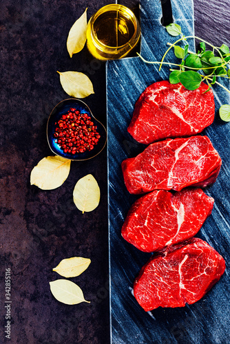 Beef steaks on cutting board