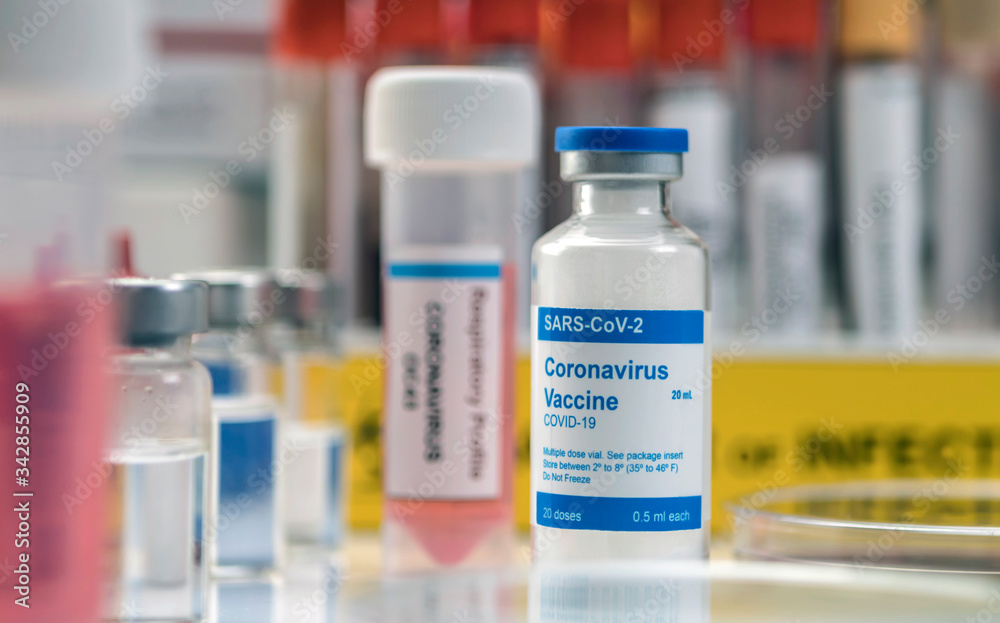 Coronavirus covid-19 experimental vaccine in a laboratory, conceptual image Coronavirus covid-19 experimental vaccine in a laboratory, conceptual image