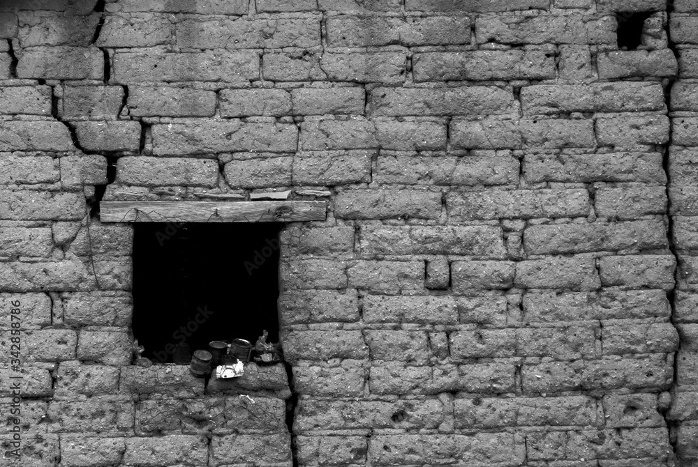 old brick wall with window