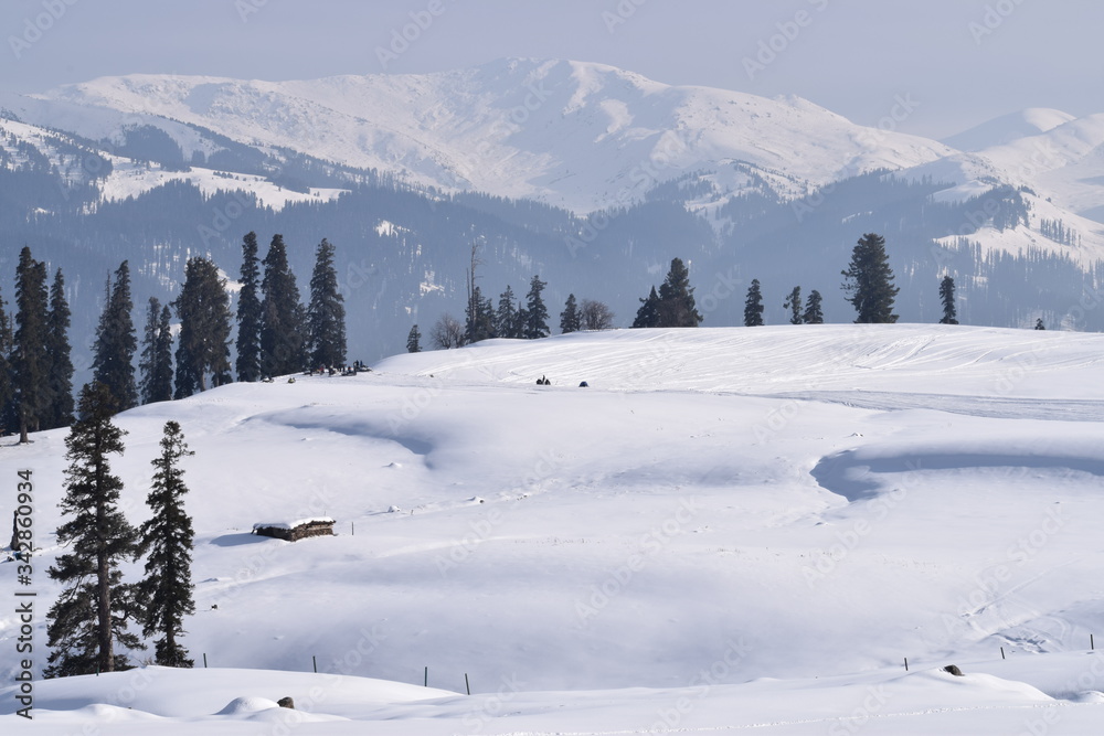 Gulmarg Gondola phase 1, Kungdoor, Kashmir. Snow/ice adventure activities snow rides, snow boarding, ice skating and world famous ski slopes for skiing. Christmas & New year holidays in Kashmir, India