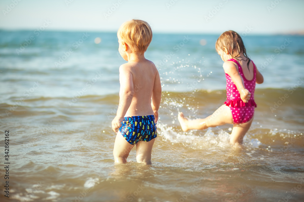 Funny twins at the sea Funny twins at the sea