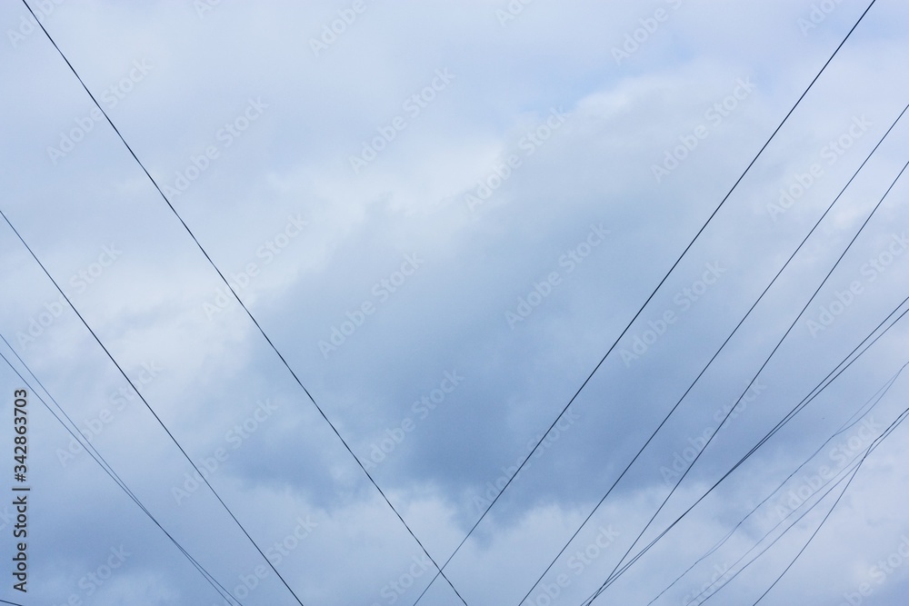 Beautiful view of clouds and electrical wires Beautiful view of clouds and electrical wires