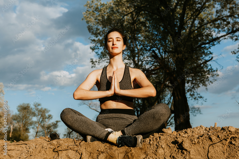 Yoga in nature, health woman. Concept of healthy lifestyle and relaxation