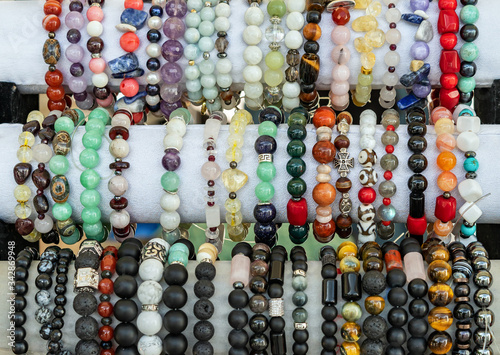 Bracelets from various natural semiprecious stones. photo