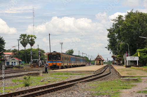 Lopburi station with a colorful train