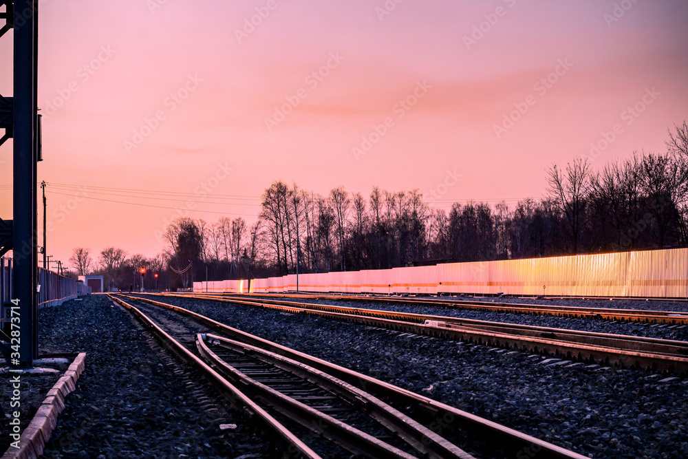 Fototapeta premium railway at sunset