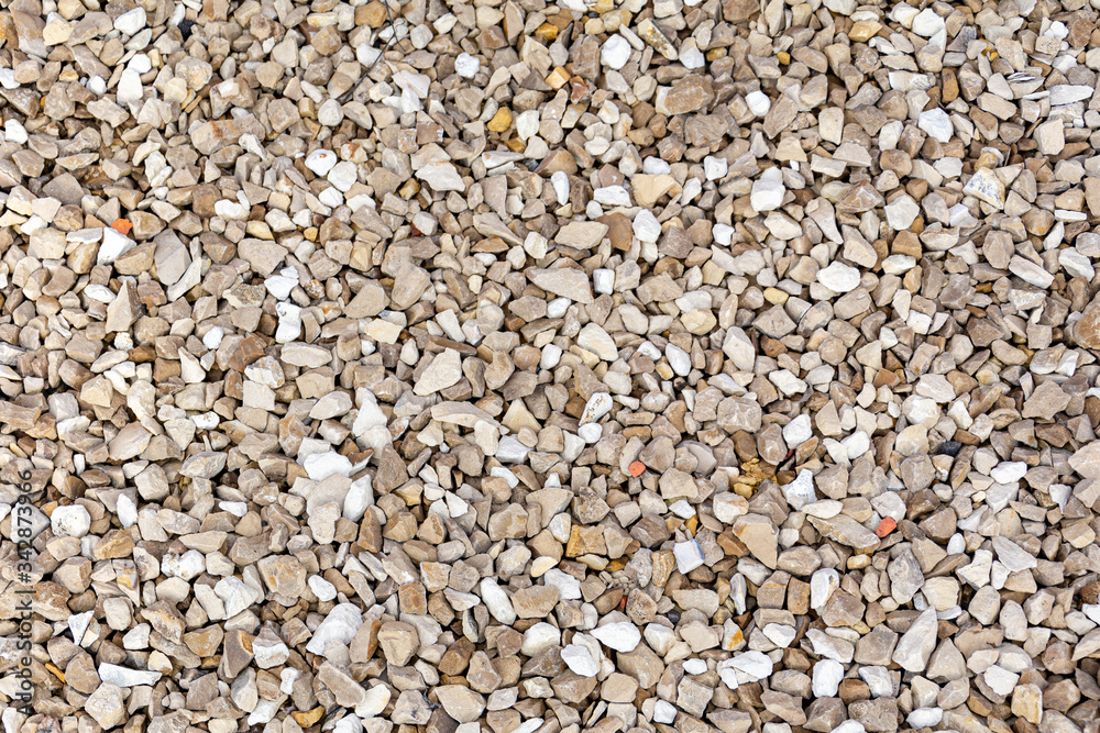 The gravels background, there are a lot of gravels that different shape and colors on the floor. The gravels background, there are a lot of gravels that different shape and colors on the floor.