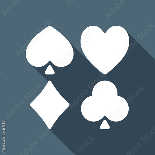 Playing cards. Hearts, spades, diamonds, clubs. White flat icon with long shadow on blue background