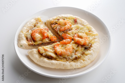 Pizza Cheese with Shrimp, Pork, Imitation Crab Stick and Salted Eggs on White Dish Wood Table on White Background Isolated.