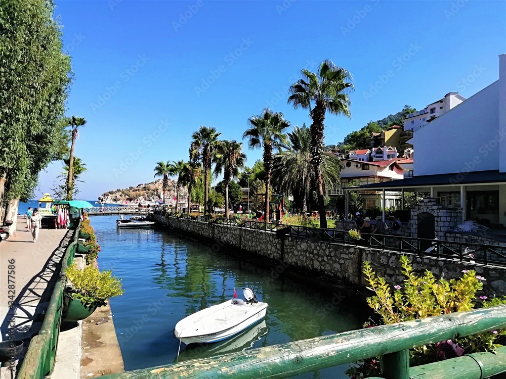 Fototapeta premium boats on the river in a village