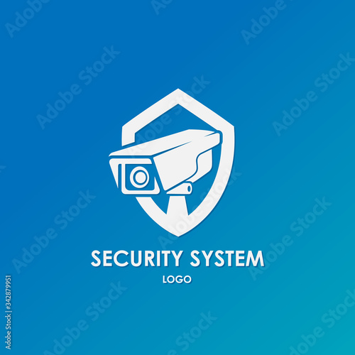 Web camera in the shield logo template. CCTV camera vector design. Security and technology illustration