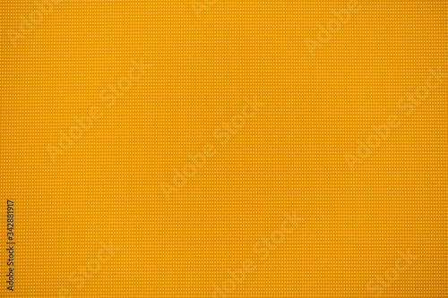 Orange surface with tiny dots