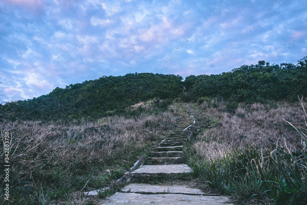 Stairs of Twin Peak Hong Kong. Hiking Trail in Hong Kong. Climbing stairs during blue hour. Overcome challenge. Strive for success.
