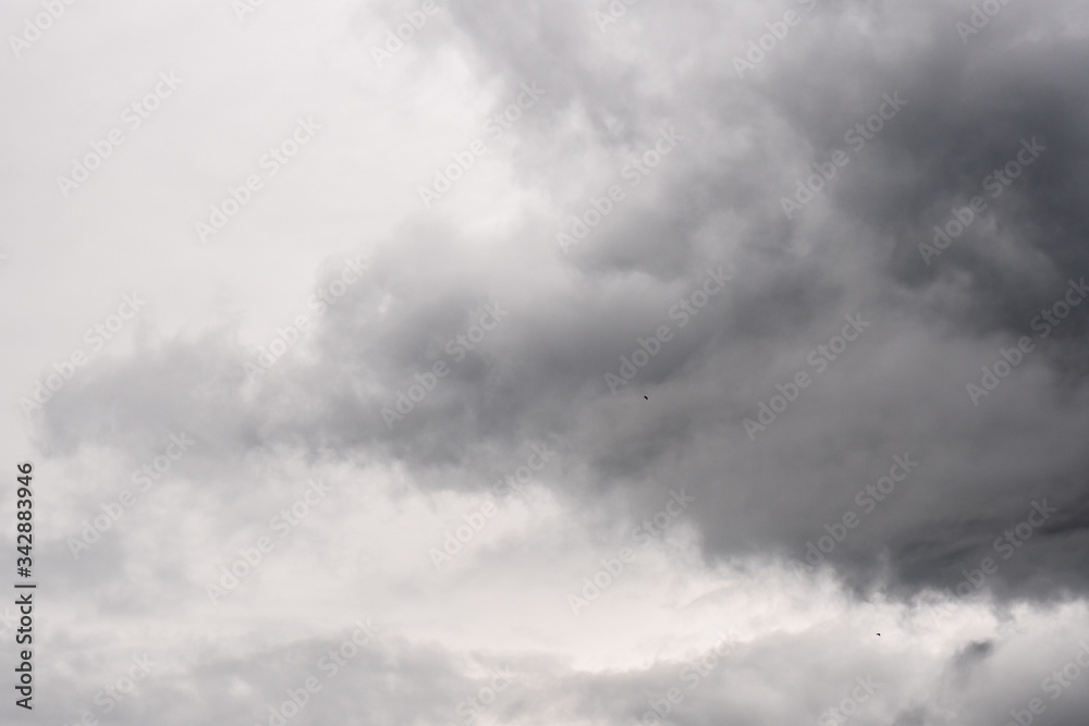 Obraz premium Dark storm sky with light part, overcast sky