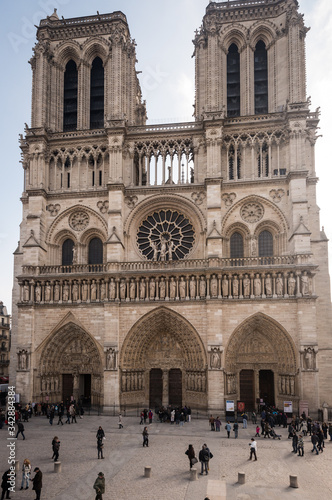 Paris, France- February 2013: Exterior and entrance to Notre Dame cathedral