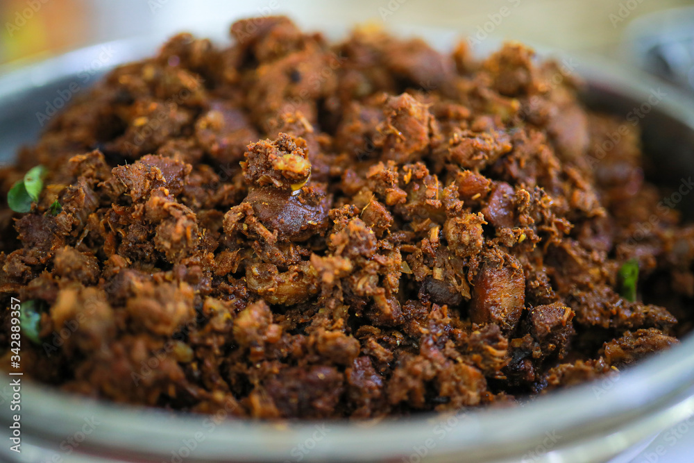 Kerala style beef dry fry. delicious spicy Beef fry in banquet table