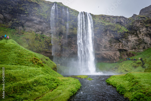 Fototapeta Naklejka Na Ścianę i Meble -  Famous Seljalandsfoss waterfall on Seljalands River that has its origin in volcano glacier Eyjafjallajokull, Iceland