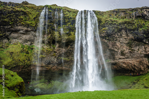 Seljalandsfoss waterfall  part of Seljalands River that has its origin in the volcano glacier Eyjafjallajokull  Iceland